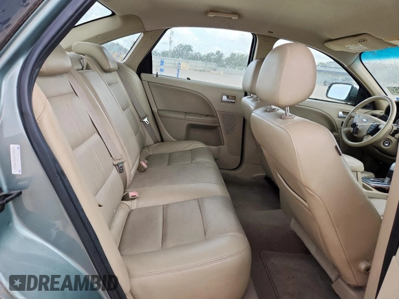 2007 Ford Five Hundred Limited z VIN 1FAHP25117G143252, wystawiony jako Copart lot #62322425 z przebiegiem 118 717 mil mil oraz Czysty tytuł • Clean title. Historia ofert i sprzedaży dostępna na DreamBid. Obrazek 10.
