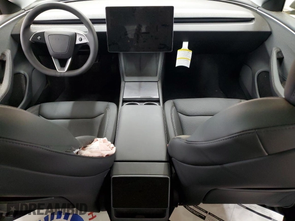 2025 Tesla Model 3 Long Range z VIN 5YJ3E1EA2SF930959, wystawiony jako Copart lot #54921345 z przebiegiem 168 mil mil oraz Szkoda całkowita • Salvage title. Historia ofert i sprzedaży dostępna na DreamBid. Obrazek 8.