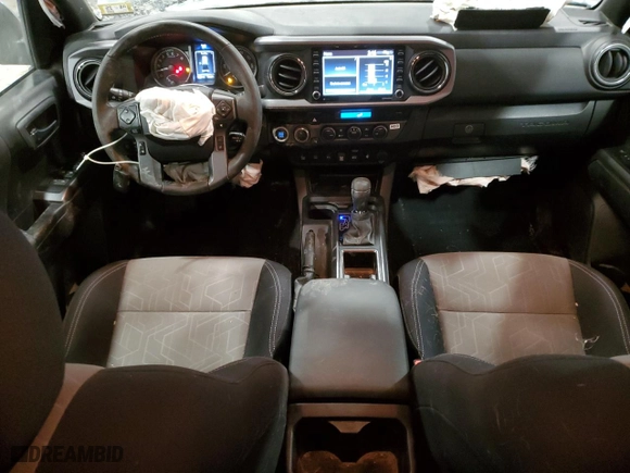 2023 Toyota Tacoma 4WD SR with VIN 3TYCZ5AN2PT156093, listed as a Copart auction lot 45577245 with 33,687 mi miles and Salvage Title. Bid and sale history available at carsss.com. Image 8.