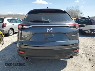 2021 Mazda CX-9 Touring z VIN JM3TCACY5M0500924, wystawiony jako Copart lot #50654505 z przebiegiem 57 067 mil mil oraz Szkoda całkowita • Salvage title. Historia ofert i sprzedaży dostępna na DreamBid. Obrazek 6.