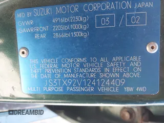 2002 Suzuki XL-7 Standard with VIN JS3TX92V124124409, listed as a IAAI auction lot 42166017 with 194,418 mi miles. Bid and sale history available at carsss.com. Image 9.