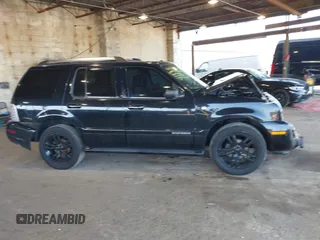 2008 Mercury Mountaineer Premier with VIN 4M2EU48E28UJ14713, listed as a IAAI auction lot 41764387 with 173,034 mi miles. Bid and sale history available at carsss.com. Image 13.