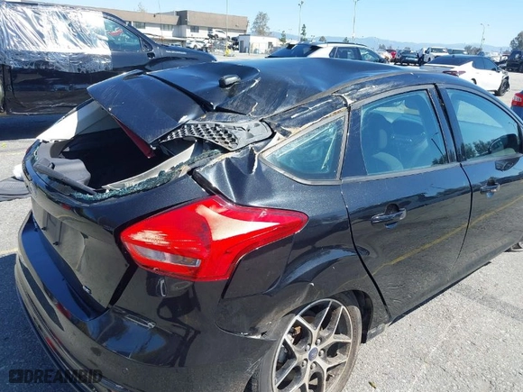 2015 Ford Focus SE with VIN 1FADP3K22FL261768, listed as a IAAI auction lot 41830768 with 121,957 mi miles. Bid and sale history available at carsss.com. Image 6.