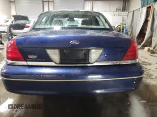 2004 Ford Crown Victoria LX z VIN 2FAFP74W94X171212, wystawiony jako Copart lot #82830214 z przebiegiem 217 595 mil mil oraz Szkody całkowita. Historia ofert i sprzedaży dostępna na DreamBid. Obrazek 6.