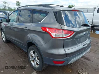 2013 Ford Escape SE with VIN 1FMCU9GX3DUD35255, listed as a IAAI auction lot 42197543 with 154,359 mi miles and . Bid and sale history available at DreamBid. Image 3.