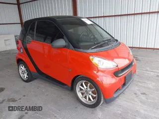 2008 Smart fortwo Pure with VIN WMEEJ31X78K134344, listed as a IAAI auction lot 42103293 with 72,832 mi miles and . Bid and sale history available at DreamBid. Image 1.