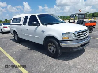 2003 Ford F-150 XL with VIN 1FTRX17W53NA40472, listed as a IAAI auction lot 42491035 with Not provided miles and . Bid and sale history available at DreamBid. Image 1.