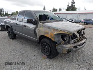 2006 Dodge 1500 SLT z VIN 1D7HU18216S601553, wystawiony jako IAAI lot #42257206 z przebiegiem Nie podano mil oraz . Historia ofert i sprzedaży dostępna na DreamBid. Obrazek 1.