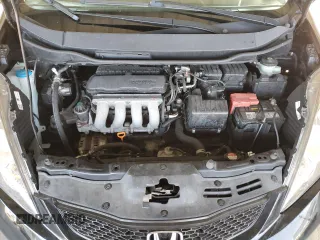 2010 Honda Fit Sport with VIN JHMGE8H46AS027813, listed as a Copart auction lot 52589035 with 212,672 mi miles and Salvage Title. Bid and sale history available at carsss.com. Image 11.