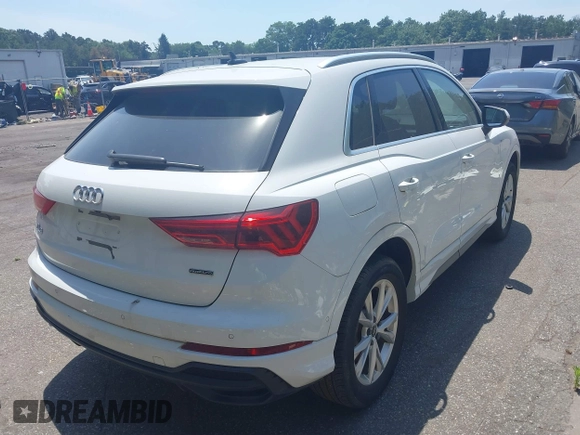2021 Audi Q3 S line Premium Plus with VIN WA1EECF32M1047731, listed as a IAAI auction lot 39714835 with 15,939 mi miles and . Bid and sale history available at DreamBid. Image 4.