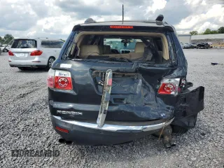 2010 GMC Acadia SLT1 with VIN 1GKLVMED2AJ239759, listed as a Copart auction lot 56412195 with 235,228 mi miles and Salvage title. Bid and sale history available at DreamBid. Image 6.