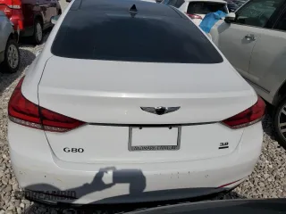 2018 Genesis G80 3.8L с VIN KMHGN4JE2JU256275, выставлен на аукционе Copart как лот 88252675 с пробегом 105 669 миль миль и Списание • Salvage title. История ставок и продаж доступна на DreamBid. Изображение 6.