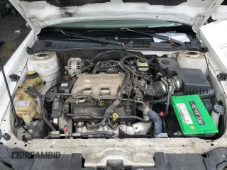 1997 Oldsmobile Cutlass GLS z VIN 1G3NG52M6V6303805, wystawiony jako Copart lot #81500424 z przebiegiem 129 429 mil mil oraz Szkody całkowita. Historia ofert i sprzedaży dostępna na DreamBid. Obrazek 11.