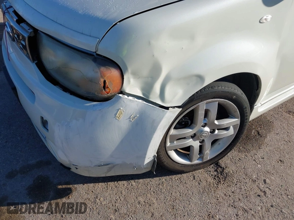 2009 Nissan Cube SL z VIN JN8AZ28R19T106532, wystawiony jako IAAI lot #40675288 z przebiegiem Nie podano mil oraz . Historia ofert i sprzedaży dostępna na DreamBid. Obrazek 6.