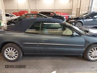 2002 Chrysler Sebring Limited with VIN 1C3EL65R92N272242, listed as a IAAI auction lot 41164755 with 52,086 mi miles and . Bid and sale history available at DreamBid. Image 13.