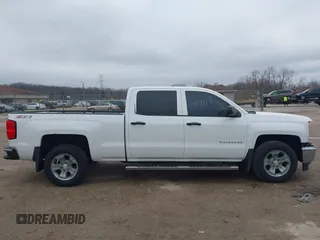 2014 Chevrolet Silverado 1500 LT with VIN 3GCUKREC6EG194197, listed as a IAAI auction lot 41999718 with 206,916 mi miles and . Bid and sale history available at DreamBid. Image 14.