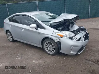 2015 Toyota Prius Four z VIN JTDKN3DU0F0455819, wystawiony jako IAAI lot #42169941 z przebiegiem 63 861 mil mil oraz . Historia ofert i sprzedaży dostępna na DreamBid. Obrazek 1.