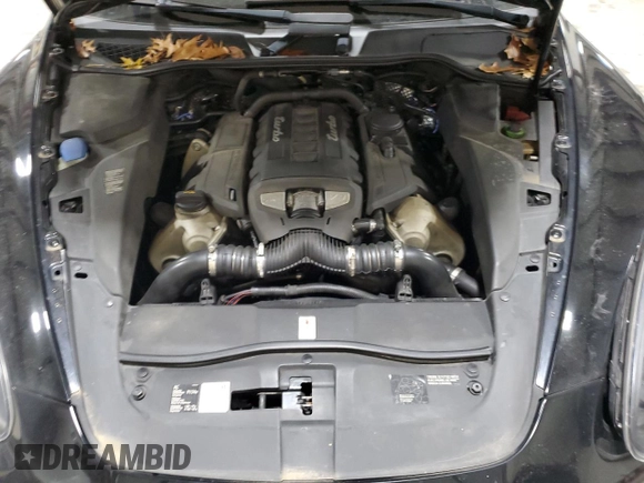 2012 Porsche Cayenne Turbo z VIN WP1AC2A21CLA84144, wystawiony jako Copart lot #82688294 z przebiegiem 124 143 mil mil oraz Szkoda całkowita • Salvage title. Historia ofert i sprzedaży dostępna na DreamBid. Obrazek 12.