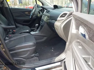 2014 Buick Encore Convenience with VIN KL4CJBSB1EB572110, listed as a IAAI auction lot 41659786 with 101,284 mi miles and . Bid and sale history available at DreamBid. Image 5.