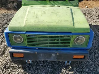 1986 Suzuki Samurai z VIN JS4JC51C8G4114216, wystawiony jako Copart lot #46191465 z przebiegiem 67 177 mil mil oraz Tytuł czysty. Historia ofert i sprzedaży dostępna na DreamBid. Obrazek 11.