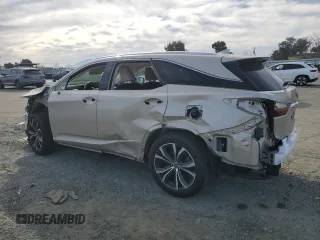 2019 Lexus RX 350L Premium with VIN JTJDZKCA3K2020772, listed as a Copart auction lot 47033295 with 76,679 mi miles and Salvage Title. Bid and sale history available at DreamBid. Image 2.