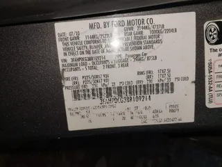 2011 Ford Fusion SEL with VIN 3FAHP0CG3BR109214, listed as a IAAI auction lot 40759895 with 160,343 mi miles. Bid and sale history available at carsss.com. Image 9.