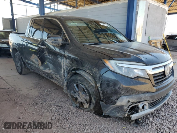 2020 Honda Ridgeline RTL-E with VIN 5FPYK3F75LB009423, listed as a Copart auction lot 54187325 with 96,128 mi miles and Salvage title. Bid and sale history available at DreamBid. Image 4.