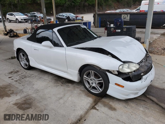 2004 Mazda MX-5 Miata LS z VIN JM1NB353640407864, wystawiony jako Copart lot #53951315 z przebiegiem 116 295 mil mil oraz Szkoda całkowita • Salvage title. Historia ofert i sprzedaży dostępna na DreamBid. Obrazek 4.