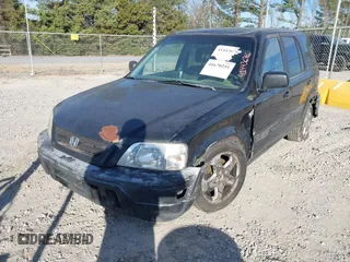 2000 Honda CR-V LX with VIN JHLRD2843YS006747, listed as a IAAI auction lot 41670251 with 345,195 mi miles. Bid and sale history available at carsss.com. Image 6.