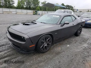 2016 Dodge Challenger R/T Plus with VIN 2C3CDZBTXGH101019, listed as a Copart auction lot 58730045 with 111,234 mi miles and Salvage title. Bid and sale history available at DreamBid. Image 1.