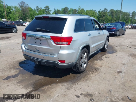 2011 Jeep Grand Cherokee Overland with VIN 1J4RR6GGXBC526649, listed as a IAAI auction lot 42162327 with 185,129 mi miles and . Bid and sale history available at DreamBid. Image 4.