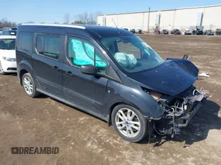 2014 Ford Transit Connect XLT with VIN NM0GS9F73E1147056, listed as a IAAI auction lot 41774521 with Not provided miles and . Bid and sale history available at DreamBid. Image 1.