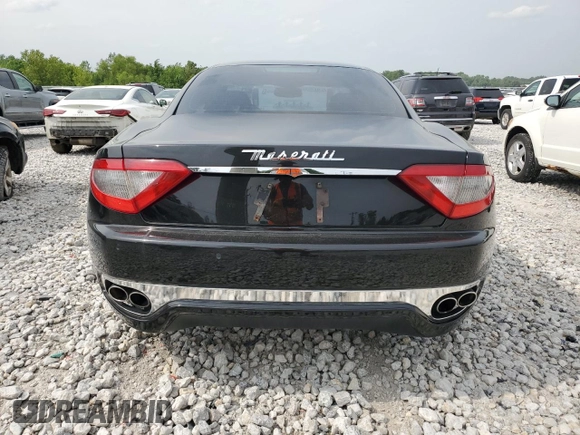 2008 Maserati GranTurismo z VIN ZAMGJ45A480034390, wystawiony jako Copart lot #59290025 z przebiegiem 54 645 mil mil oraz Czysty tytuł • Clean title. Historia ofert i sprzedaży dostępna na DreamBid. Obrazek 6.