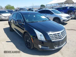 2013 Cadillac XTS Luxury z VIN 2G61P5S30D9220113, wystawiony jako IAAI lot #41970214 z przebiegiem 52 476 mil mil oraz . Historia ofert i sprzedaży dostępna na DreamBid. Obrazek 1.