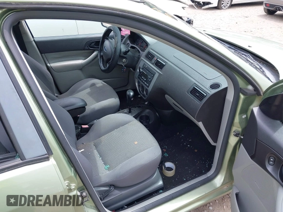 2007 Ford Focus S z VIN 1FAHP37N47W278284, wystawiony jako IAAI lot #42246383 z przebiegiem 164 830 mil mil oraz . Historia ofert i sprzedaży dostępna na DreamBid. Obrazek 5.