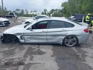 2018 BMW 4 Series 440i with VIN WBA4J5C57JBF07227, listed as a IAAI auction lot 41562986 with 76,316 mi miles and . Bid and sale history available at DreamBid. Image 14.