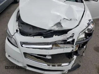 2012 Chevrolet Malibu LTZ with VIN 1G1ZG5E72CF279662, listed as a Copart auction lot 52764605 with 123,848 mi miles and Salvage Title. Bid and sale history available at DreamBid. Image 11.