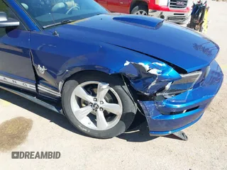 2009 Ford Mustang with VIN 1ZVHT84NX95133912, listed as a IAAI auction lot 42046053 with 57,438 mi miles and . Bid and sale history available at DreamBid. Image 6.