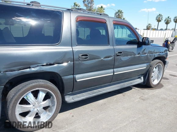 2003 Chevrolet Suburban LS with VIN 3GNEC16T63G115908, listed as a IAAI auction lot 41950165 with 202,075 mi miles. Bid and sale history available at carsss.com. Image 6.