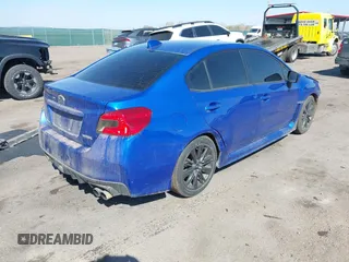2015 Subaru WRX with VIN JF1VA1A60F9825977, listed as a IAAI auction lot 42059651 with 137,234 mi miles and . Bid and sale history available at DreamBid. Image 4.