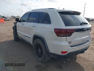 2011 Jeep Grand Cherokee Overland Summit with VIN 1J4RR6GT9BC586712, listed as a IAAI auction lot 42427655 with 157,549 mi miles and . Bid and sale history available at DreamBid. Image 3.