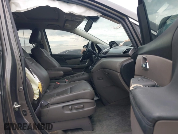 2015 Honda Odyssey Touring Elite with VIN 5FNRL5H99FB089642, listed as a IAAI auction lot 42591786 with 100,755 mi miles and . Bid and sale history available at DreamBid. Image 5.