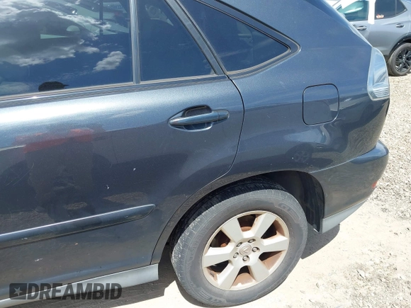 2005 Lexus RX 330 z VIN 2T2GA31U85C031830, wystawiony jako IAAI lot #42773281 z przebiegiem 188 859 mil mil oraz . Historia ofert i sprzedaży dostępna na DreamBid. Obrazek 13.