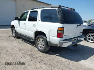 2004 Chevrolet Tahoe Z71 z VIN 1GNEK13ZX4R269230, wystawiony jako IAAI lot #41780307 z przebiegiem 249 453 mil mil oraz . Historia ofert i sprzedaży dostępna na DreamBid. Obrazek 3.