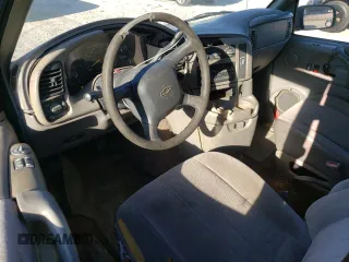 2000 Chevrolet Astro with VIN 1GNDM19W6YB180580, listed as a Copart auction lot 77676494 with 413,650 mi miles and Salvage Title. Bid and sale history available at carsss.com. Image 8.