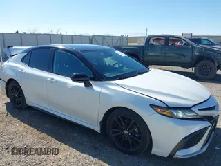 2022 Toyota Camry TRD with VIN 4T1KZ1AK9NU065266, listed as a IAAI auction lot 41554687 with 35,254 mi miles and . Bid and sale history available at DreamBid. Image 1.