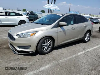 2018 Ford Focus SE z VIN 1FADP3F23JL303948, wystawiony jako Copart lot #55698915 z przebiegiem 85 500 mil mil oraz Szkoda całkowita • Salvage title. Historia ofert i sprzedaży dostępna na DreamBid. Obrazek 1.