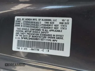 2013 Honda Odyssey EX-L with VIN 5FNRL5H65DB011071, listed as a IAAI auction lot 41992265 with 192,624 mi miles and . Bid and sale history available at DreamBid. Image 9.