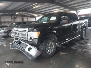 2014 Ford F-150 XL with VIN 1FTFW1CF1EKE50377, listed as a IAAI auction lot 41840173 with 221,366 mi miles. Bid and sale history available at carsss.com. Image 2.