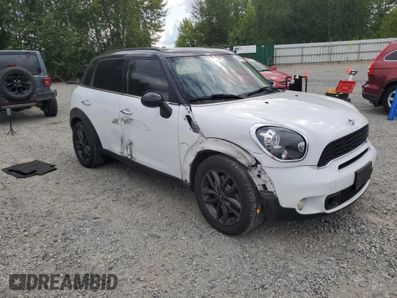 2013 MINI Countryman S with VIN WMWZC3C57DWP23397, listed as a Copart auction lot 61419665 with 139,838 mi miles and Salvage title. Bid and sale history available at DreamBid. Image 4.
